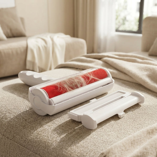 Close-up of a grooming vacuum attachment gently brushing through a dog's fur to remove loose hair.